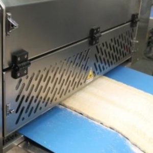 La macchina fa parte di una linea di produzione di